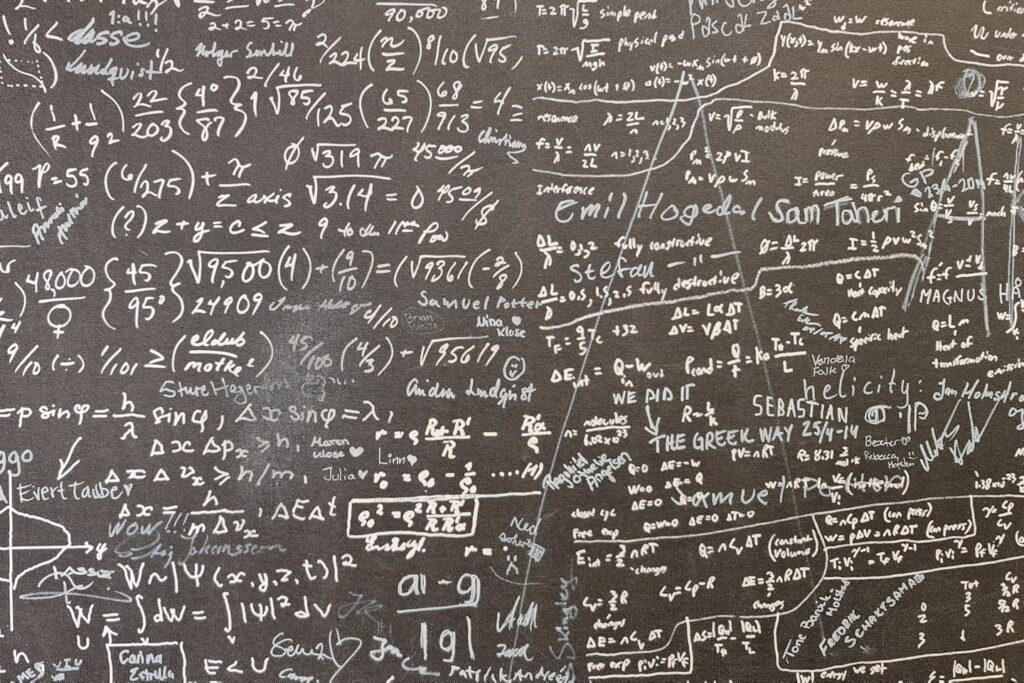 a blackboard with a lot of writing on it